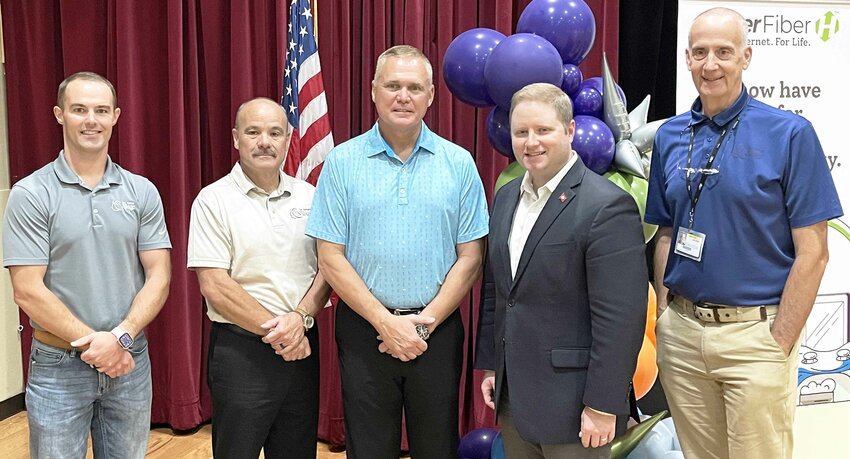 Joining to celebrate broadband provider Hyperfiber’s groundbreaking in Hot Springs Village on Aug. 28 are, from left, Matt Broome, Duane Talbet, Kelly Hale, Arkansas Department of Commerce broadband director Glen Howie and Ken Unger. (Lewis Delavan photo)