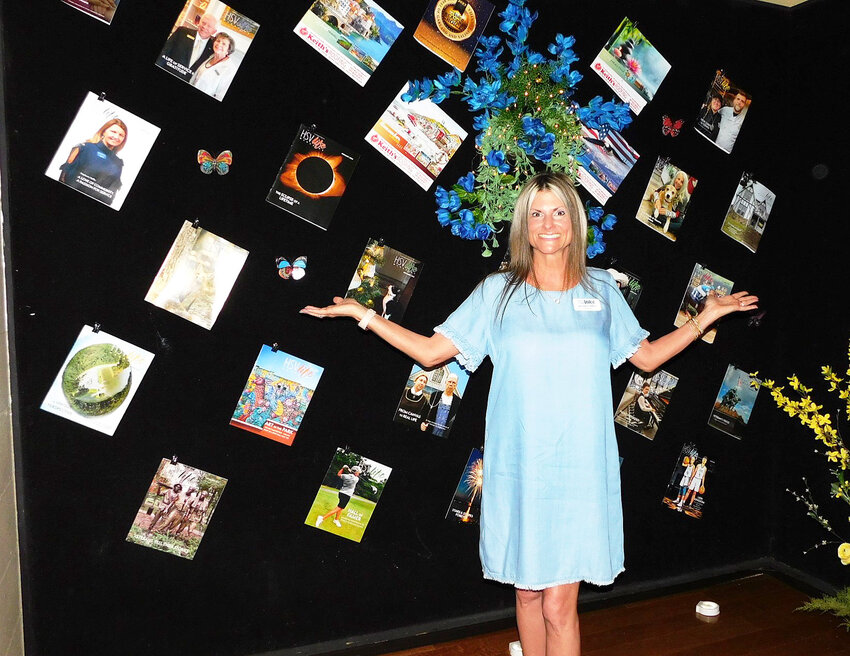 Hot Springs Village Voice Owner/Publisher Jennifer Allen welcomes all to the C of C Business Expo and proudly displays issues of the monthly HSV Life Magazine. (Sandy Johansen photos)