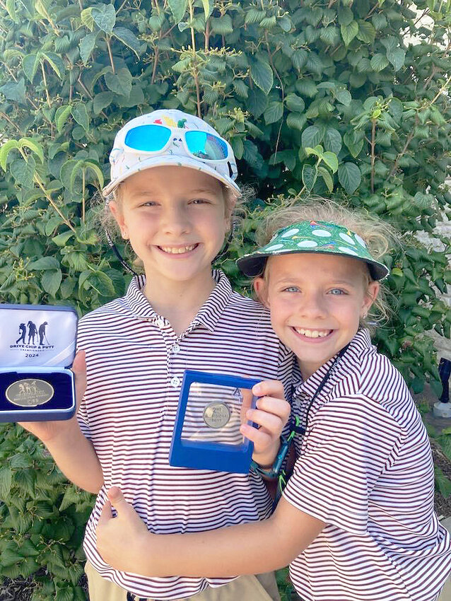 Selah and Liana Schneider at the ‘drive, chip and putt’ sub-regional’s in Tulsa. (Photo courtesy Scott Harness)