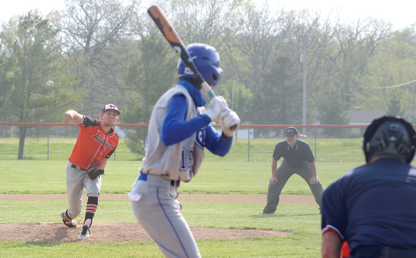 Hillsboro's Jace Tuetken completes his delivery during the Toppers' home opener on Tuesday, April 27. Hillsboro led 8-7 after four innings, but six runs by the Comets in the final two frames resulted in the Toppers' first loss of the season.