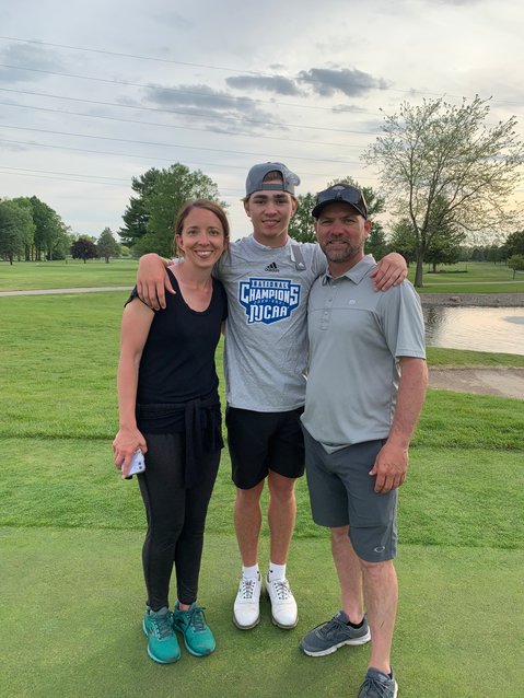Alex White celebrates with his parents, Jim and Sarah White of Hillsboro, after the Cobras claimed their first National Junior College Athletic Association national championship in men&rsquo;s golf on May 21 at Swan Lake Resort in Plymouth, IN.