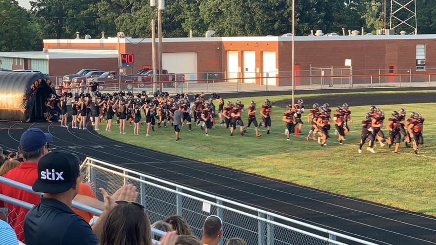 Welcomed by the Hillsboro High School cheerleaders, the 2021 edition of the HHS football team stormed through the tunnel on Friday, Aug. 20, for the annual scrimmage at Sawyer Field. The Toppers hit the gridiron for real on Friday, Aug. 27, in Greenville.