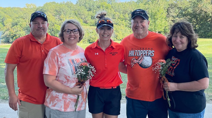 The Hillsboro girls golf program celebrated the contributions of lone senior Meagan Jorn before their match with Lincolnwood on Friday, Sept. 10, at the Hillsboro Country Club. Pictured with Jorn (center) are her parents, Troy and Paula Bartz (left) and Denny and Marcy Jorn (right).