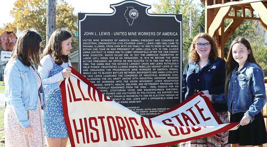Young ladies from Panama&ndash;Taylor VanOstran, Madison VanOstran, Alivia Willman and Maryn Tarver&ndash;unveiled the Illinois State Historical Society marker commemorative the life of labor organizer John L. Lewis on Friday afternoon, Nov. 5, in Panama.