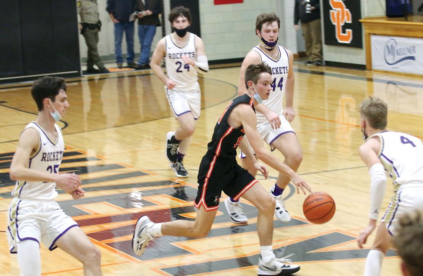 Lincolnwood&rsquo;s Braden Whalen brings the ball down the court for the Lancers during their opening game at the 71st annual Waverly Holiday Tournament, with four defenders from Jacksonville Routt surrounding the junior guard. The Rockets&rsquo; defense suffocated the Lancers on Monday, Dec. 27, holding them to just 17 points, but Lincolnwood played better on Tuesday, before taking a tough 50-44 loss to Carrollton to end their time at the tourney.