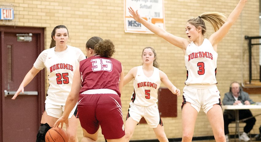 Three members of the Nokomis High School girls basketball team were honored with spots on this year&rsquo;s MSM Conference all-conference team, which was recently selected by the coaches of the conference. Above, from the left, are first team pick Audrey Sabol (#25), honorable mention Natalie Engelman (#5) and second team pick Hailey Engelman (#3).