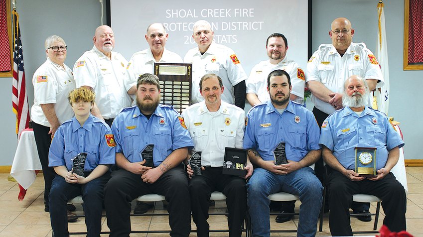 Several members of the Shoal Creek Fire Protection District were recognized as part of their annual banquet held Saturday evening, March 12, at the Sorento Fire Department. In front, from the left, are special recognition award winners Emma Conway, Tyler Tarran, firefighter of the year Kelley Voyles, special recognition award winners Caleb Daniken and Steve Hasenmyer. In the back row are trustees Kim Houchlei, Gerald Knight, Brett Kunkel, Dan Fenton, Donald Sturgeon, Jr. and David Caulk, Sr.