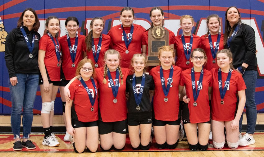 The Nokomis seventh grade volleyball team became the first trophy winner in the program&rsquo;s history on Saturday, March 12, taking second at the IESA Class 7-2A State Finals in Pawnee. In front, from the left, are Quincee Riebe, Alaina Bugg, Hannah Tarter, Lily Broers, Illexia Doyen and Olivia Black. In the back are Coach Megean Mehochko, Fallon Knodle, Leigha Smith, Brooklyn Marley, Alivia Sabol, Mackenzie Mehochko, Cloey Dirks, Carsyn Bertolino and Coach Amy Stolte.