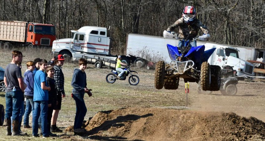Hillsboro's Briar Kuhl catches some air during his run at the Extreme XC River Bend Rally in Bloomfield, IN, on Saturday, March 5. Kuhl finished 15th in the youth quad Super Mini class and 20th overall in a 50-racer field.
