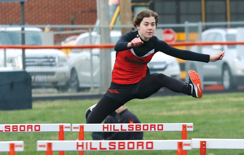 Sophomore Hannah Hughes finished third in the 100 meter hurdles on Tuesday, March 29, as Hillsboro hosted Carlinville, North Mac and Gillespie at Sawyer Field. Hughes' finish was one of eight top three finishes for the Hillsboro girls team, coached by Son Clayton.