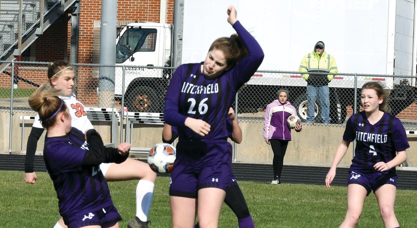 With a well-placed corner kick from Sophia Hernandez that found a gap in the Litchfield defense (from the left, Kyra Kircher, Laura Boston and Olivia Mitchell), Hillsboro's Kinley Richardson scored the only goal in Toppers' 1-0 championship game victory at the Litchfield Panther Classic on Saturday, April 2.