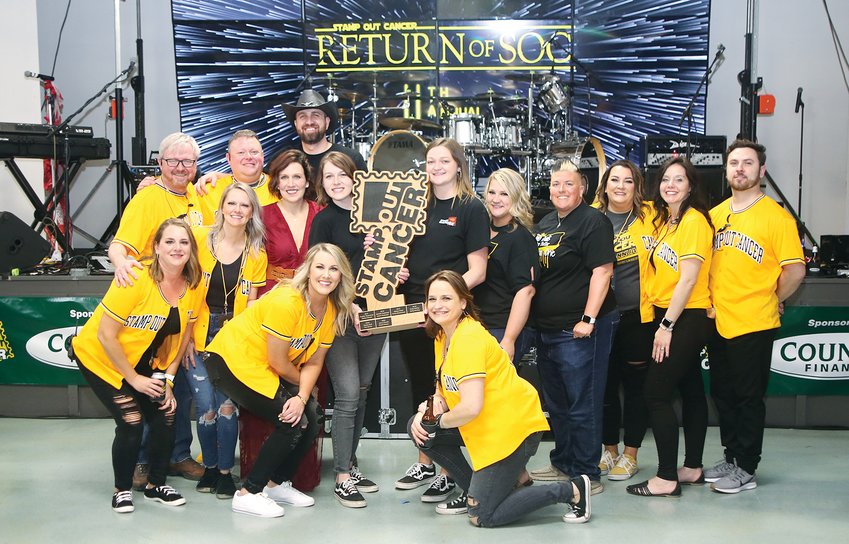 This year&rsquo;s Stamp Out Cancer committee and celebrity lip sync teams raised over $120,000 for the Montgomery County Cancer Association this year. Pictured above, from the left are Renee Laughlin, Chris Wygal, Dana Holshouser, Zach Wygal, Krystal and Trent West, Kelsey Flack,  Emily and Abby Frerichs, Theresa Priddle, Brooke and Jessica Ball, Michelle Hill, Heather Greenwood and Cory Evans.