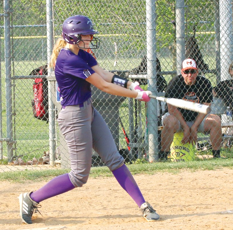 Litchfield's Emma Walch tees off on a pitch in the fifth inning for her second home run of the day as the Lady Panthers defeated Hillsboro 16-1 on Tuesday, May 10.