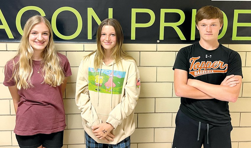 Three members of the Hillsboro Junior High School track team won their events at the IESA Class 3A sectional in Virden on Saturday, May 14, earning a spot at this weekend's state finals in the process. From the left are Jaida Linn, Izabella Fenton and Tytin Wells.