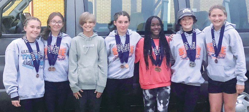 It was a banner day for the Litchfield Middle School track team as they brought home 12 medals in four events, including a state championship in the 400 by Amari Vickery. Competing in the seventh grade state tournament, from the left are Alexis Middleton, Leighton Warchol, Nick Fetter, Emma Weidner, Jada Carroll, Amari Vickery and McKenna Harmon. Not pictured is Darby Braasch, who ran both the 800 and 1600 in the eighth grade state finals.