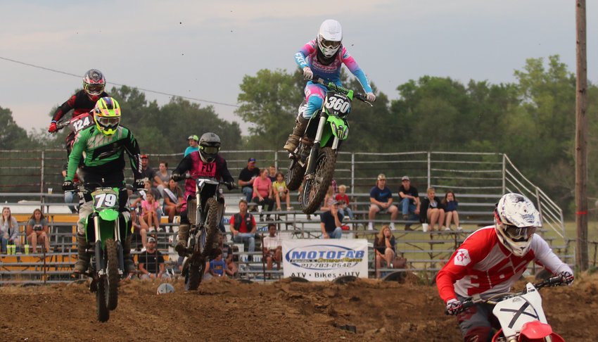 Ty White (#360) works his way through traffic on the opening lap of the 250 B motocross race at the Montgomery County Fair on Friday, June 24. The Taylor Springs racer went on to finish sixth in the race.