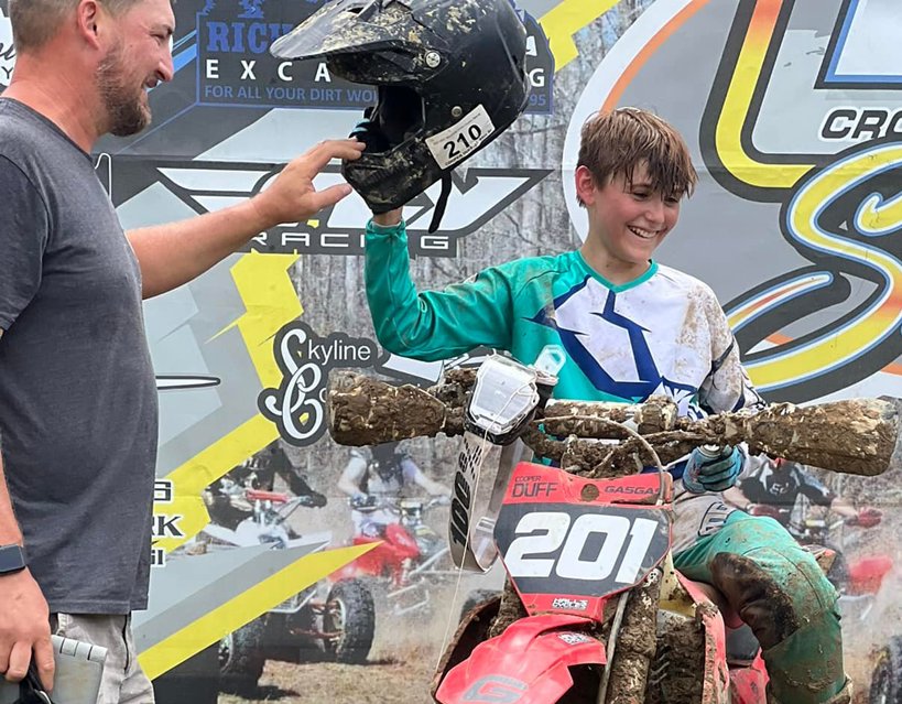 Cooper Duff and his dad, Ryan, were all smiles after Cooper&rsquo;s win in the 85cc Sr. class at the Mid-South Cross Country Series event in Crawford, TN. Duff also finished second overall in Youth Bikes, his best overall finish in the series this year.