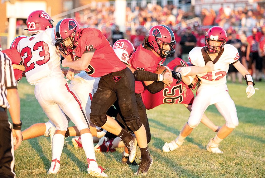 It was week one in Nokomis and the Redskins found out they still have some work to do in regards to being where they want to be. Stark County made the 150-plus mile trip to Nokomis on Friday, Aug. 26, and handed the Redskins a 49-21 loss in week one. Above, Nokomis' Craig Bertolino tries to break a tackle early in Friday's game, en route to a team-best 81 yards on the ground