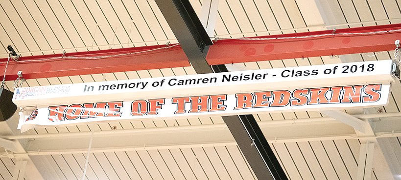 The latest tribute to the late Camren Neisler will be hard to miss for Nokomis High School sports fans as the school unveiled its new Morgan Rolling Flag on Tuesday, Aug. 30, before the Redskins' game with Gillespie. The 12' by 19' flag was made possible through the proceeds of the Camren's On The Green Golf Outing, which pays tribute to the 2018 NHS grad who passed away in October 2018.