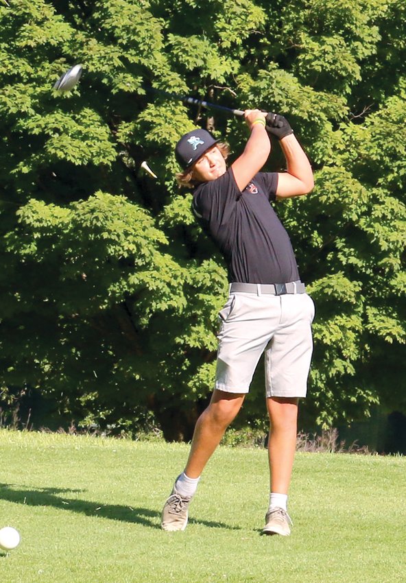 Hillsboro&rsquo;s Tycen Thacker tees off on the first hole at the Hillsboro Country Club during the Toppers&rsquo; match with Rochester on Thursday, Sept. 8. Thacker shot a 43, one of six players scoring 45 or under on the day as the Rockets edged the Toppers 175 to 171.