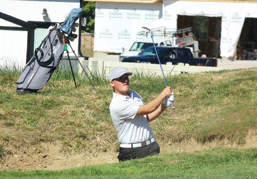 Litchfield's Tug Schwab chips out of the bunker on the par-3 16th hole at the Effingham Country Club on Monday, Oct. 3, during the Class 1A Effingham St. Anthony Sectional. Schwab parred the hole and went on to tie for second overall, helping his team qualify for state for the first time since 1990.