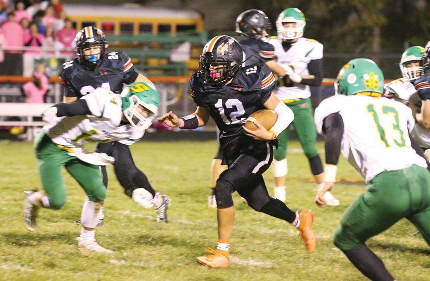 Hillsboro's Jace Stewart (#12) had 110 yards on just 13 carries in the Toppers' 28-14 win over Southwestern on Friday, Oct. 14. With the win, Hillsboro moved to 5-3 on the year and became playoff eligible for the first time since 2017.