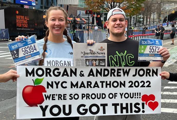 Morgan (White) and Andrew Jorn of Glen Carbon took a copy of The Journal-News with them on their November trip to New York City, NY, where they ran the New York Marathon together.