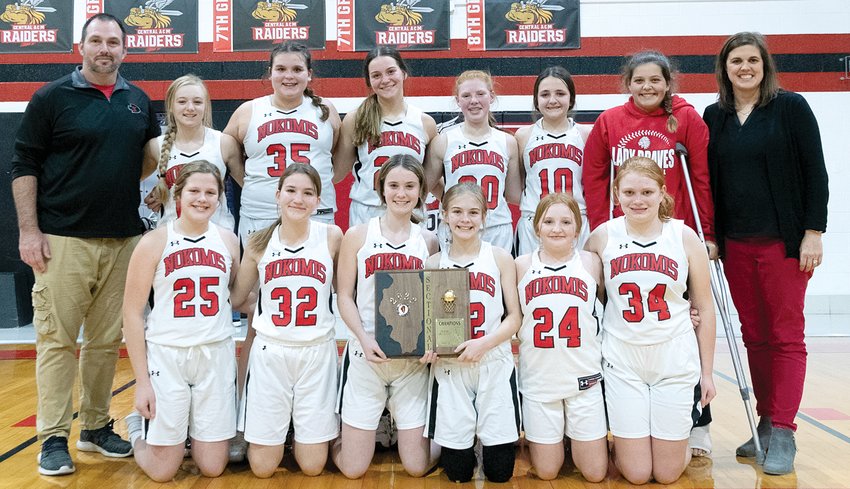 The Nokomis Junior High eighth grade girls basketball team, pictured here after their 44-31 sectional win over Hardin Calhoun, will play for third place in the IESA Class 8-2A State Finals on Thursday, Dec. 15, at 6 p.m. in Havana. In the front are Carsyn Bertolino, Emily Harston, Kara Beaty, Hannah Tarter, Quincee Riebe and Lily Broers. In the back are Coach Sean Hendrickson, Maliah Harris, Alivia Sabol, Makenzie Mehochko, Cloey Dirks, Fallon Knodle, Kendree Dean and Coach Beth King.