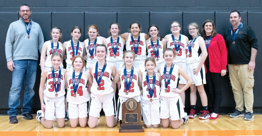 For the fourth time in school history, the Nokomis Junior High girls basketball team earned a trophy form the IESA State Finals as the seventh grade Lady Braves took fourth on Thursday, Dec. 8. In front from the left, are Joelle Jackson, Quincee Riebe, Kara Beaty, Hannah Tarter, Addi Cress and Avery West. In the back row are Jeremy Mehochko, Kennedi Aumann, Emily Harston, Lily Broers, Carsyn Bertolino, Kendree Dean, Brooklyn Marley, Paige Suslee, Nina Johnson, Coach Beth King and Coach Sean Hendrickson.