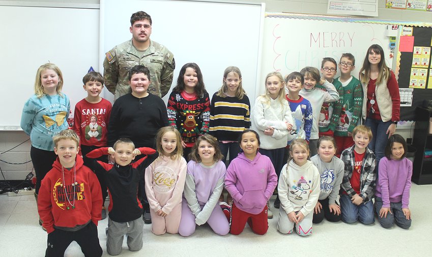 Liam Dugan made a special trip to speak to the student&rsquo;s in Mrs. Amber Stoeklin&rsquo;s third grade class at Beckemeyer Elementary School about his experience serving in the United States Army on Wednesday, Dec. 21.