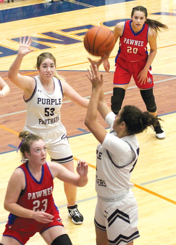 Litchfield's Gina Painter rises up for a jumper over Pawnee's Adalyn Boblitt during the seventh place game at the Riverton Holiday Classic on Thursday, Dec. 29. Litchfield jumped out to an early 12-3 lead, but Pawnee rallied to down the Purple Panthers 35-24 in their final game at the Riverton tourney.