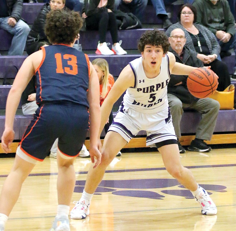 Litchfield's Tate Dobrinich (#5), shown here during the Purple Panthers' ninth place bracket semifinal against Pana, had 26 points in his team's 68-44 victory over Ramsey in the 11th place game of the Rick McGraw Memorial Invitational on Friday, Jan. 20, in Litchfield.