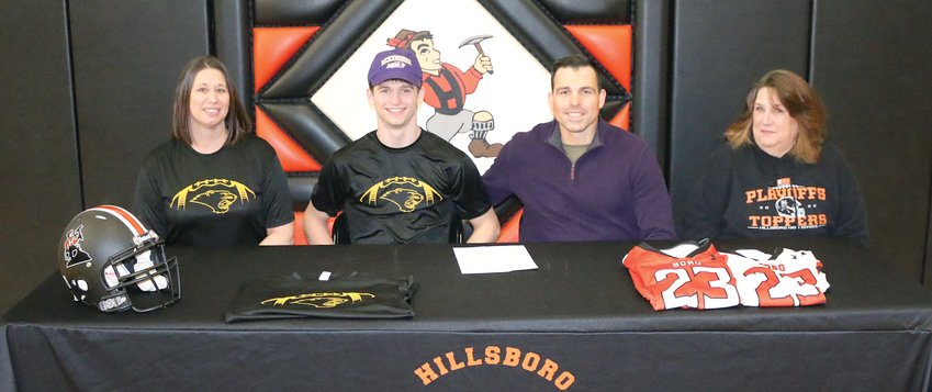 Hillsboro High School senior Brayden Fowler made his college decision official on Wednesday, Feb. 1, as he will be continuing his football and academic career at McKendree University in Lebanon. From the left are Brayden&rsquo;s mom Amanda Fowler, Brayden Fowler, Brayden&rsquo;s uncle Craig Hires and Brayden&rsquo;s grandmother Jane Weller.