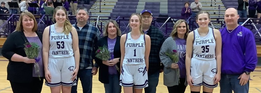 The three senior members of the Litchfield High School girls basketball team were honored along with their parents on Monday, Feb. 6, prior to the Lady Panthers&rsquo; 38-16 win over Southwestern. Pictured from the left are Laura Boston, daughter of Deanna and Chris Boston; Hailey Rentz, daughter of Karen and Craig Rentz; and Emma Walch, daughter of Dawn and Curt Walch.