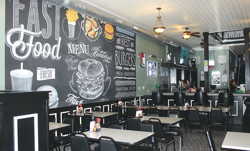 As local customers enter the new downtown Litchfield restaurant, they are welcomed with large unique chalkboard mural depicting the dishes served at EJ&rsquo;s Bistro &amp; Gaming.