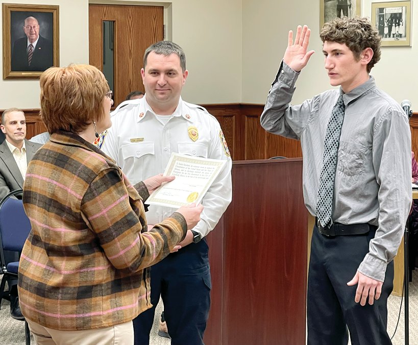 Hillsboro High School grad and Coffeen native Justin Kershaw was sworn in as one of the newest members of the Litchfield Fire Department on Thursday, March 16, by Litchfield City Clerk Carol Burke and Fire Chief Adam Pennock.