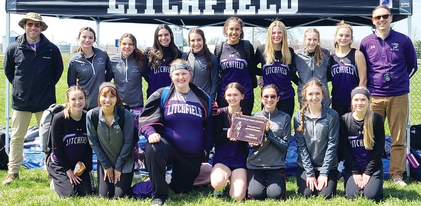 The Litchfield High School girls track team scored in all 17 events in which they entered and took the top spot in the eight-team Carlinville Invitational on Friday, April 7. In front, from the left, are Caitlyn Travis, Kayleigh Morrow, Rilynne Nockman, Delanie Ulrich, Myka Fenton, Emma Diveley and Claudia Deren. In the back row are Coach Jeremy Palmer, Brooke Braasch, Alex Gasperson, Kendall Stewart, Paityn Buzick, Gina Painter, Izabella Fenton, Gracie Boden, Darby Braasch and Coach Shane Cress.