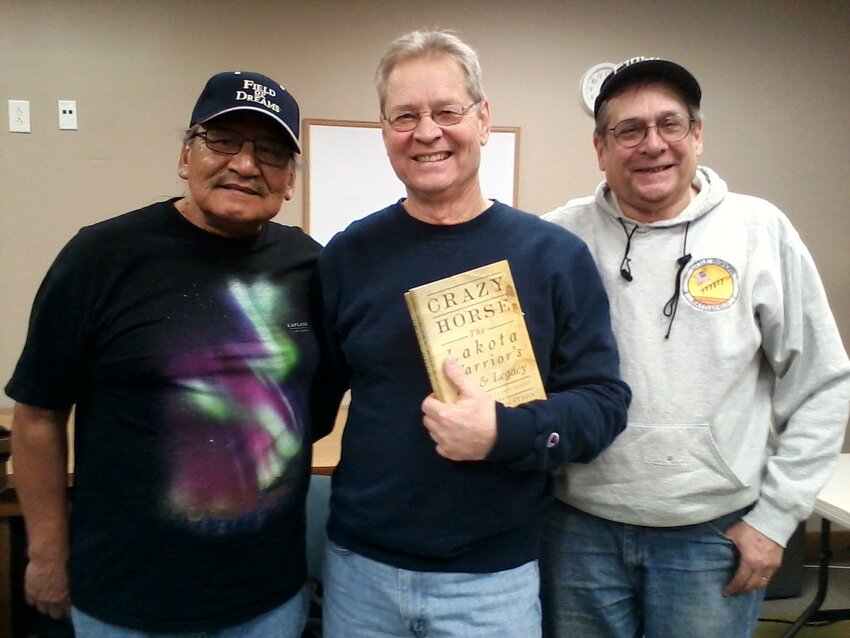 The Allen family of Litchfield recently donated a signed copy of Crazy Horse: The Lakota Warrior&rsquo;s Life and Legacy to the Litchfield Public Library. Pictured above, from the left, are Floyd Clown, Sr., Crazy Horse&rsquo;s grandson, David Allen of Litchfield and William Matson, author.