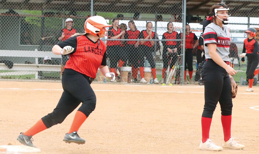 Lincolnwood senior JoBeth Matli rounds first after picking up a single in the Lady Lancers' 12-6 win over Bunker Hill on Thursday, April 27. Matli was one of four seniors from Lincolnwood and Morrisonville honored before the game, along with Ashley Walton, Justine Seelbach and Avery Pope.