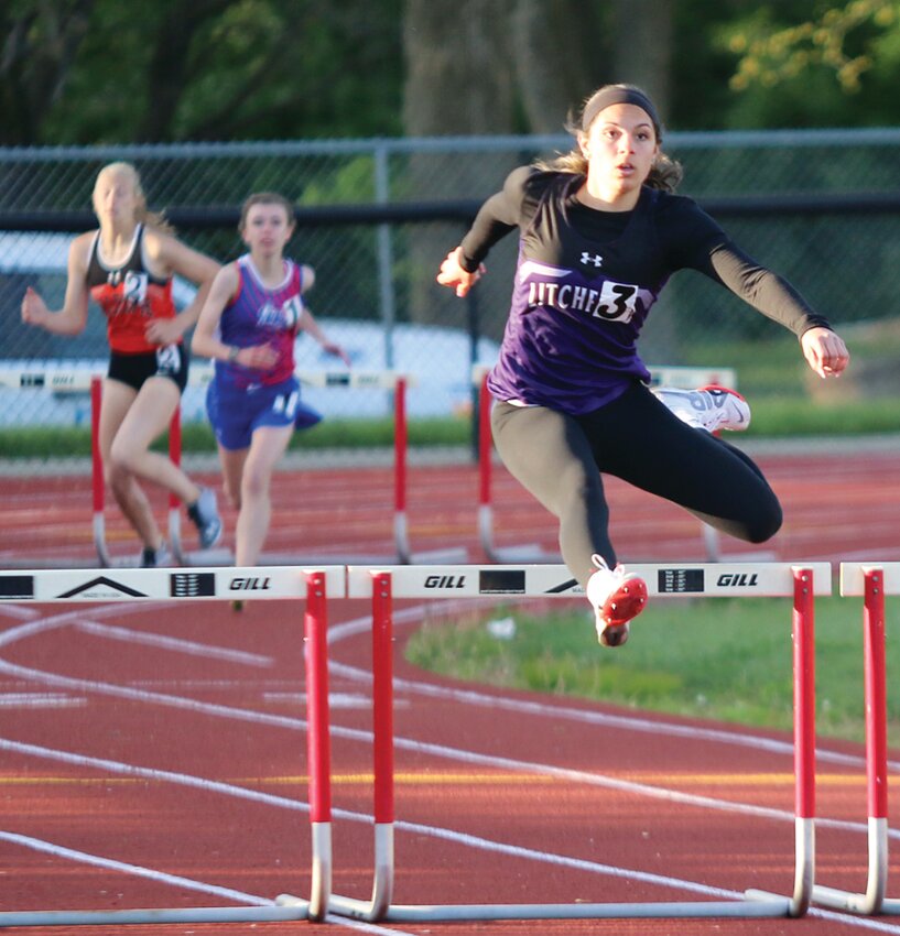 With her closest competition still on the final turn, Litchfield's Kendall Stewart clears the first hurdle in the front stretch of her run in the 300 meter hurdles on Tuesday, May 2, at the South Central Conference Championships in Staunton. Stewart played a part in 40 of Litchfield's conference title winning 164.33 points on Tuesday, winning the 300 meter hurdles, the 200, the pole vault and running a leg in the Panthers' 4x100 relay.