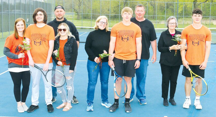 It was senior night for the Hillsboro High School boys tennis team and the Toppers celebrated with an 8-1 win over Mt. Zion. This year&rsquo;s seniors, from the left, Izac Adams with parents Megan Strasbaugh and Wayne and Miranda Adams; Kyle Butler, with parents Laura and Fred Butler; and Ethan Schreiber, with grandmother Janice Kirk.