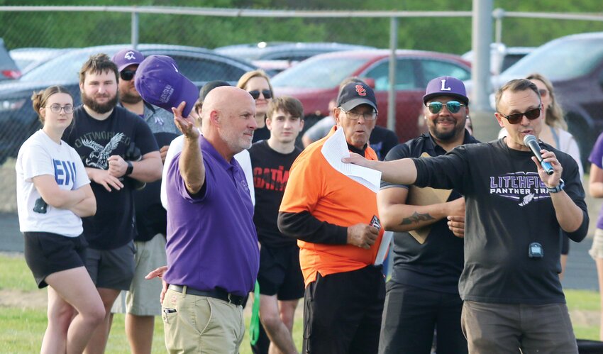 Called in jest &quot;the balding head... of Litchfield track and field,&quot; by fellow Litchfield Coach Shane Cress, the soon-to-be retired Litchfield High School Boys Track Coach Dan Newkirk was honored for his 33 years of commitment to mentoring young athletes during the Panthers' final home meet of the 2023 season on Thursday, May 4.