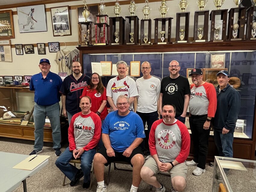 Pictured above, in front, from the left are Rick Zucker of Chesterfield, MO, Carl Riechers of Wentzville, MO and Jeremy Gibbs of St. Peters, MO. In back are Tony Parker of Rochester, Ryan and Jennifer Van Der Karr of Dwight, Chad Kahl of Bloomington, Brian Flaspohler of Chesterfield, MO, Sean Kolodziej of Joliet, Jim Leefers of Coffeen and Bill Pearce of  Elmhurst.