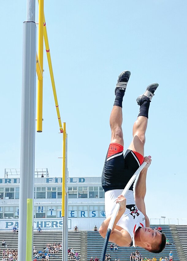 With the O'Brien Field press box in the background, Hillsboro High School senior Tanner Clayton goes up for one of his attempts at clearing 3.8 meters in the pole vault at the IHSA Class 1A State Finals track meet in Charleston on Thursday, May 25.