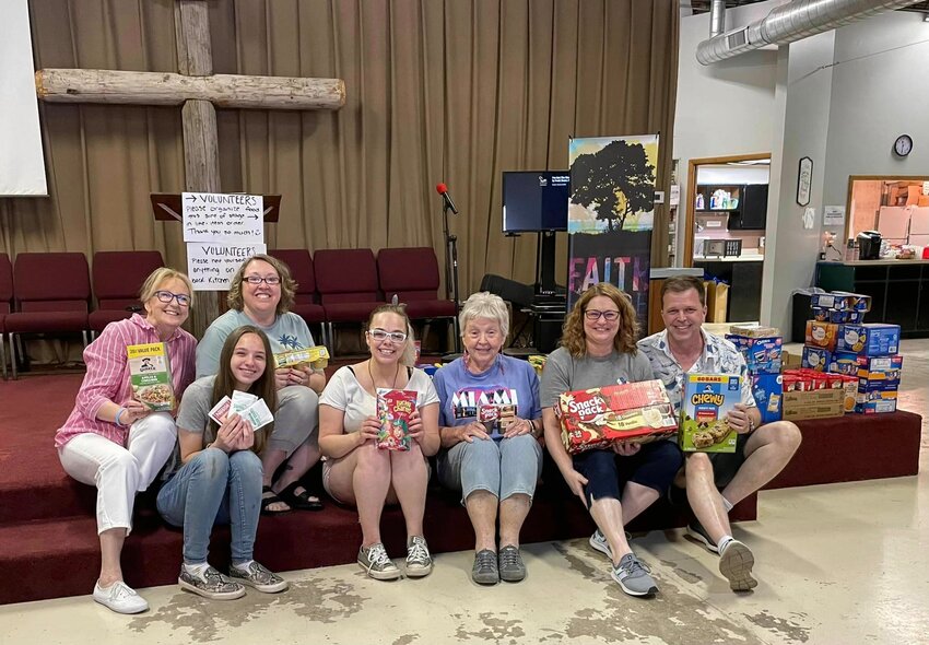 Taylor Meyers and members of the Blended Artists Imaginarium Theater Group kicked of their summer by organizing a food drive to benefit local youth. Above, are (L-R) Liz Huber, Paula Bartz, Frankie Huber, Taylor Meyers, Paula Keepper, Denise Renee and Brian Goss.
