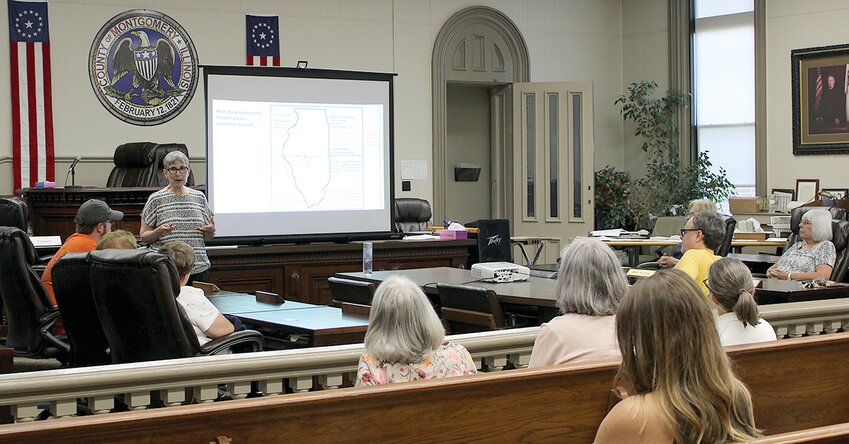 Above, Dr. Helaine Silverman from the University of Illinois Mythic Mississippi Project speaks to a group of community members about how they can work with the project to expand Hillsboro&rsquo;s tourism reach.