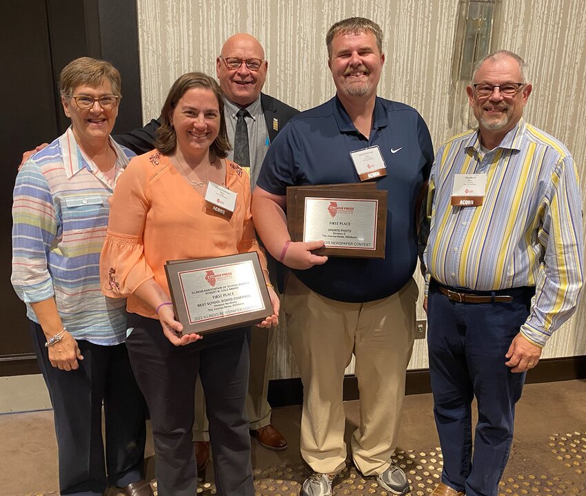 Members of The Journal-News staff were honored with more than two dozen awards at this year&rsquo;s Illinois Press Association convention on Thursday, June 8, in Bloomington. Pictured above, from the left are owner Susie Galer, Editor Mary (Galer) Herschelman, owner John M. Galer, Sports Editor Kyle Herschelman and Publisher Mike Plunkett.