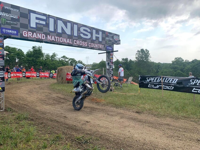 Walshville's Travis Lentz goes wheels up across the finish line at the Hoosier in Crawfordsville, IN, on May 6-7, in celebration of his sixth win in a row in the Grand National Cross Country racing series.