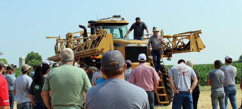 Kent &ldquo;Skip&rdquo; Klinefelter, owner and CEO of Linco-Precision, (in front, center) welcomes farmers and retailers from throughout the region to the company&rsquo;s Summer Field Day. Attendees had the opportunity to see newly launched agriculture technology in action and talk to sales representatives during the educational event.