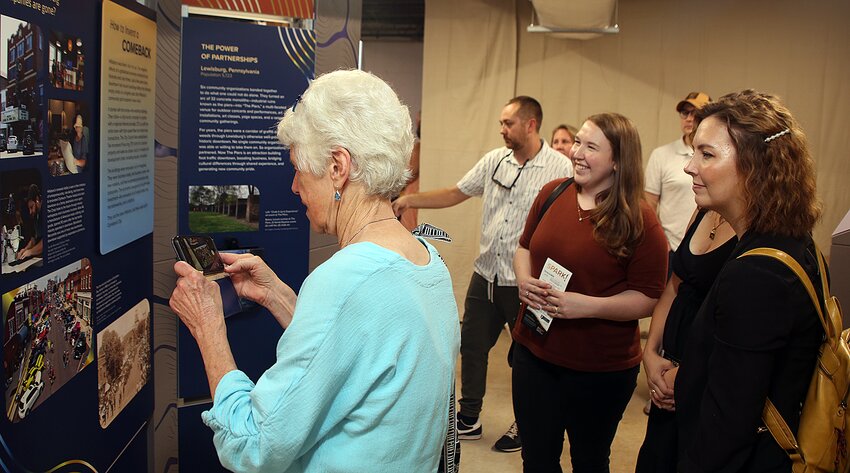 Nancy Slepicka uses the interactive function on Hillsboro&rsquo;s section of the &ldquo;Spark! Places of Innovation&rdquo; Smithsonian Institute exhibit now in the basement of the Hillsboro Area Public Library.